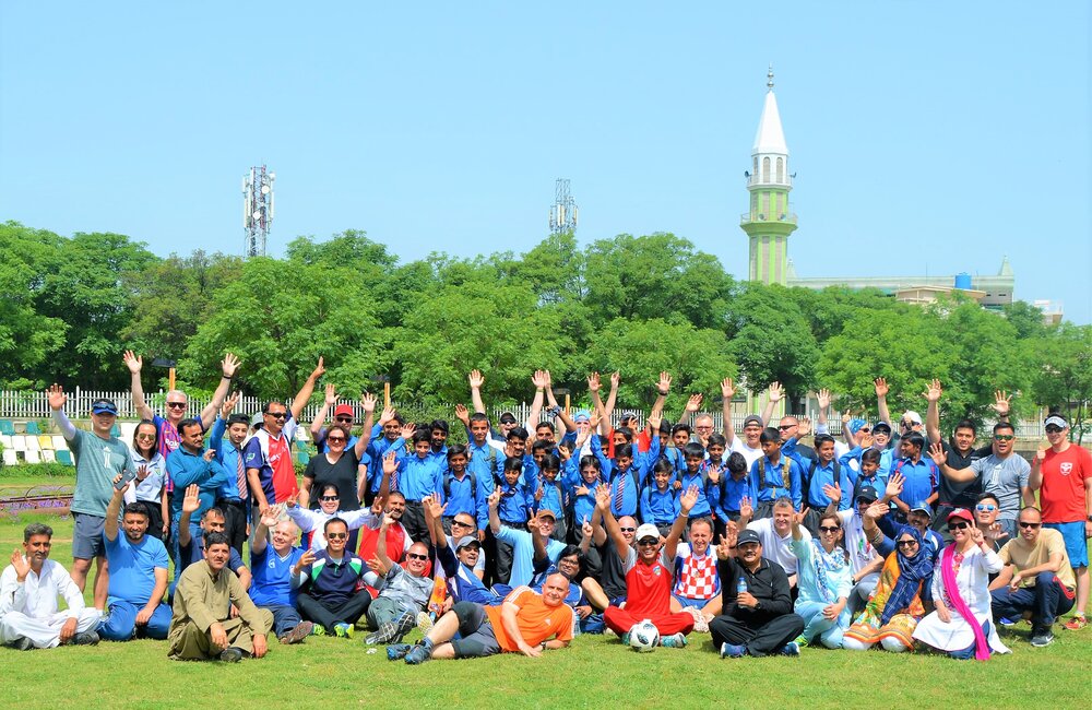 STUDENTS WELCOME UNMO'S & UNMOGIP STAFF AT F-11 CRICKET GROUND, ISLAMABAD